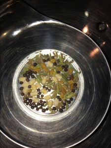 This is the tempering mixture. Little mustard, fennel, cumin, methi seeds, urad dal.