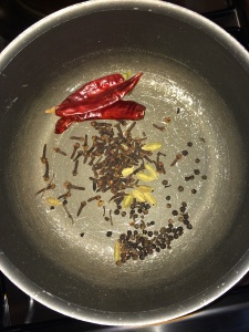 Finally dry roast the cloves, pepper, cardamom and dry red chilies.